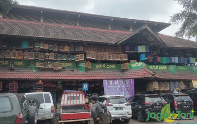 uploads/news/2022/11/pasar-burung-pramuka-surga-57772bf11de0672_400.jpg